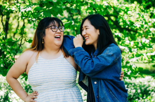 Two Friends laughing together at the Missouri Botanical Garden.
